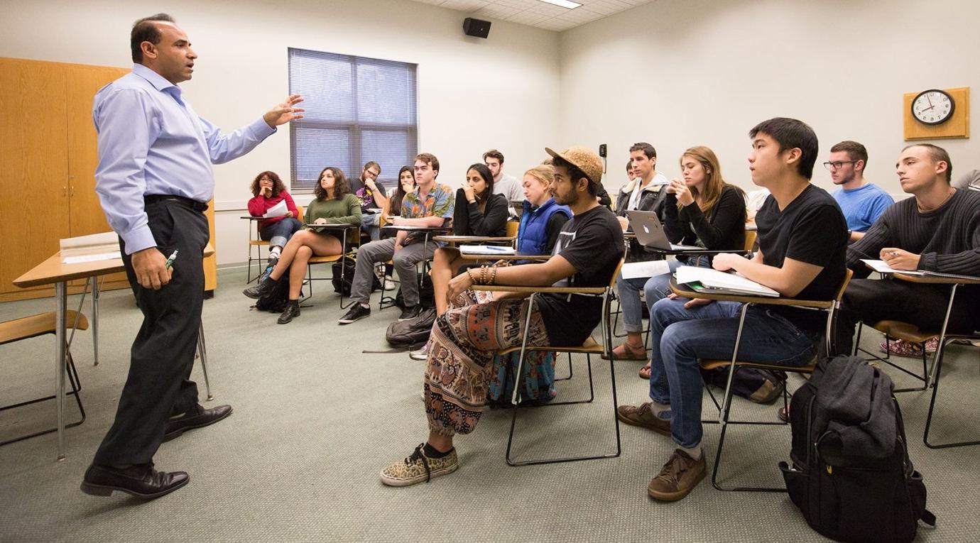 professor alwishah lectures to a group of philosophy students